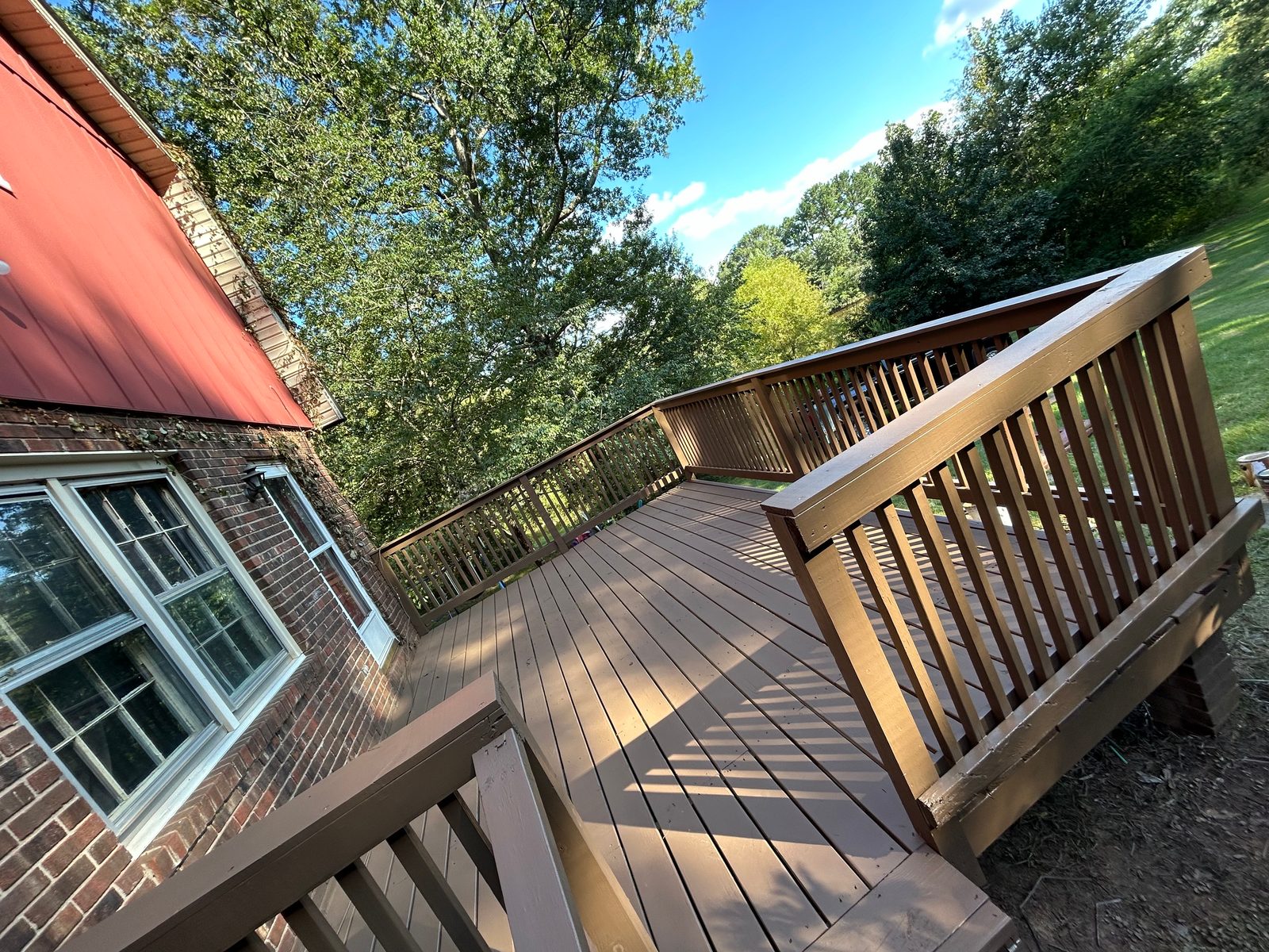 Old deteriorated deck being demolished before rebuild
